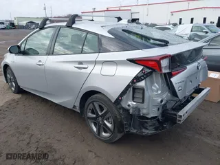 2022 Toyota Prius L Eco with VIN JTDKAMFU7N3154962, listed as a IAAI auction lot 40714455 with 53,588 mi miles. Bid and sale history available at carsss.com. Image 3.
