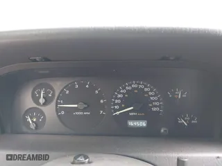 1999 Jeep Grand Cherokee Limited with VIN 1J4GW68N5XC684157, listed as a IAAI auction lot 42104283 with 164,506 mi miles. Bid and sale history available at carsss.com. Image 7.