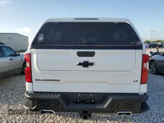 2023 Chevrolet Silverado 1500 LT Trail Boss with VIN 3GCUDFE8XPG329141, listed as a Copart auction lot 65902224 with 10,132 mi miles and Salvage Title. Bid and sale history available at DreamBid. Image 6.
