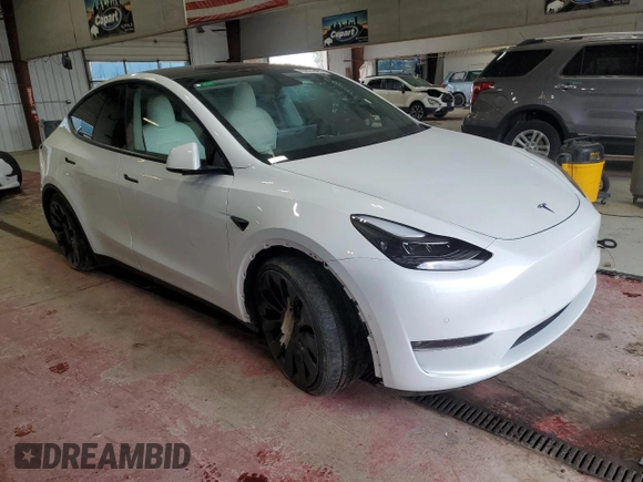 2022 Tesla Model Y Performance with VIN 7SAYGDEF9NF405370, listed as a Copart auction lot 43621095 with 52,292 mi miles and Salvage Title. Bid and sale history available at DreamBid. Image 4.