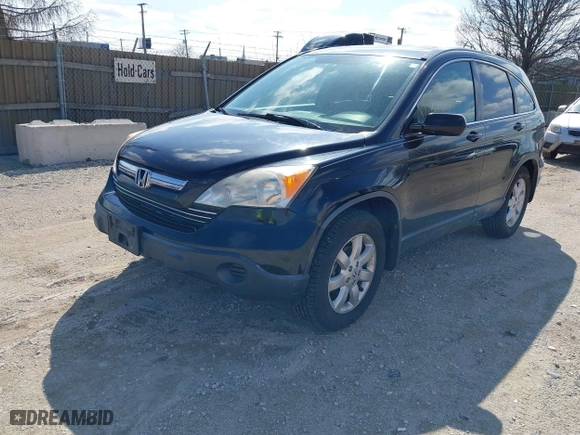 2007 Honda CR-V EX-L with VIN JHLRE38737C019763, listed as a IAAI auction lot 41933749 with 208,901 mi miles. Bid and sale history available at carsss.com. Image 2.