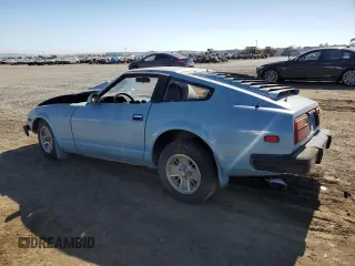 1979 Datsun 280ZX z VIN HS130123182, wystawiony jako Copart lot #61076424 z przebiegiem 48 711 mil mil oraz Szkody całkowita. Historia ofert i sprzedaży dostępna na DreamBid. Obrazek 2.