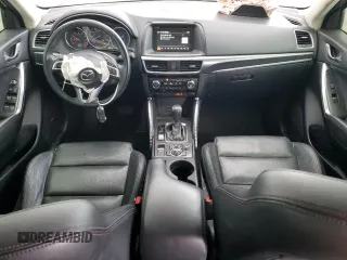 2016 Mazda CX-5 Grand Touring with VIN JM3KE2DYXG0784971, listed as a Copart auction lot 43865605 with 146,025 mi miles and Salvage Title. Bid and sale history available at carsss.com. Image 8.