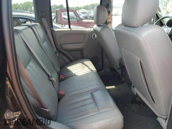 2005 Jeep Liberty Limited with VIN 1J8GL58K05W711624, listed as a Copart auction lot 62479315 with 138,904 mi miles and Salvage title. Bid and sale history available at DreamBid. Image 11.
