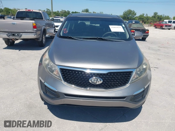 2014 Kia Sportage LX with VIN KNDPB3AC7E7595527, listed as a IAAI auction lot 42062615 with 64,777 mi miles. Bid and sale history available at carsss.com. Image 6.