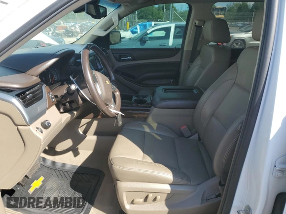 2019 Chevrolet Tahoe LT z VIN 1GNSCBKCXKR379274, wystawiony jako Copart lot #57878805 z przebiegiem 77 936 mil mil oraz Czysty tytuł • Clean title. Historia ofert i sprzedaży dostępna na DreamBid. Obrazek 7.