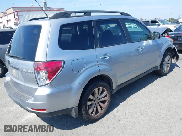 2013 Subaru Forester X Premium with VIN JF2SHADC4DH403421, listed as a IAAI auction lot 42475417 with 91,973 mi miles and . Bid and sale history available at DreamBid. Image 4.