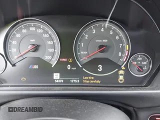 2015 BMW M4 z VIN WBS3R9C54FK329174, wystawiony jako IAAI lot #41923136 z przebiegiem 54 379 mil mil oraz . Historia ofert i sprzedaży dostępna na DreamBid. Obrazek 7.