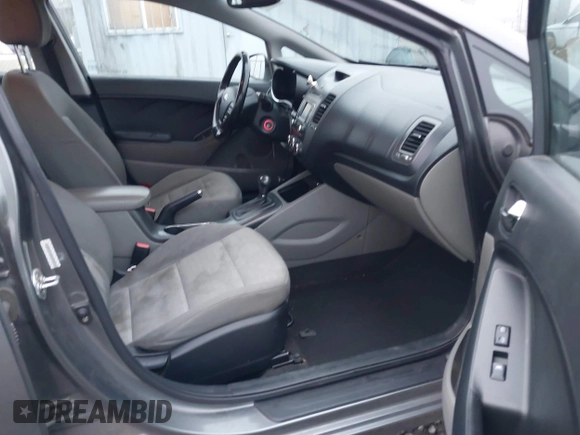 2014 Kia Forte EX with VIN KNAFX4A8XE5213014, listed as a IAAI auction lot 41000589 with 89,890 mi miles. Bid and sale history available at carsss.com. Image 5.