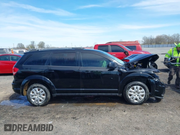 2017 Dodge Journey SE z VIN 3C4PDCAB2HT698940, wystawiony jako IAAI lot #41843176 z przebiegiem 141 499 mil mil oraz . Historia ofert i sprzedaży dostępna na DreamBid. Obrazek 13.