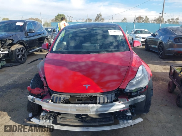 2022 Tesla Model 3 with VIN 5YJ3E1EA1NF288903, listed as a IAAI auction lot 41610215 with 96,050 mi miles and . Bid and sale history available at DreamBid. Image 12.