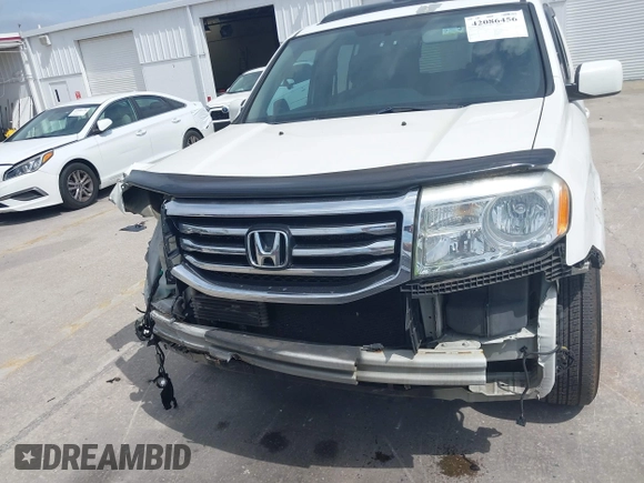 2014 Honda Pilot EX-L with VIN 5FNYF4H52EB055549, listed as a IAAI auction lot 42086456 with 292,594 mi miles and . Bid and sale history available at carsss.com. Image 13.