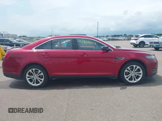 2014 Ford Taurus SHO with VIN 1FAHP2KT1EG133940, listed as a IAAI auction lot 42805214 with 141,204 mi miles and . Bid and sale history available at DreamBid. Image 13.