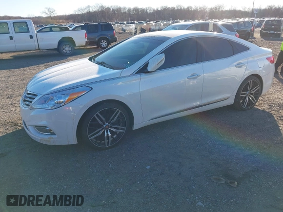 2012 Hyundai Azera with VIN KMHFH4JG0CA162291, listed as a IAAI auction lot 41012822 with 205,531 mi miles. Bid and sale history available at carsss.com. Image 2.