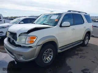 2003 Toyota Sequoia SR5 with VIN 5TDZT34A13S153605, listed as a IAAI auction lot 41798398 with 103,018 mi miles. Bid and sale history available at carsss.com. Image 2.