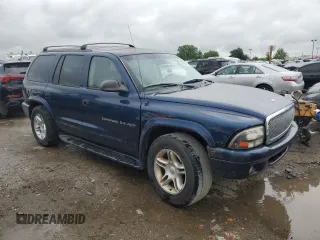 2001 Dodge Durango with VIN 1B4HS28Z71F589202, listed as a Copart auction lot 58522665 with 233,451 mi miles and Salvage title. Bid and sale history available at DreamBid. Image 4.