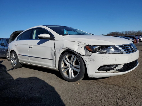 2014 Volkswagen CC Lux with VIN WVWRP7AN6EE528612, listed as a Copart auction lot 84805884 with 92,024 mi miles and Salvage Title. Bid and sale history available at carsss.com. Image 4.