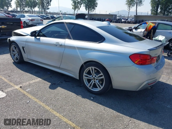 2014 BMW 4 Series 428i xDrive with VIN WBA3N9C54EF721188, listed as a IAAI auction lot 42143305 with Not provided miles and . Bid and sale history available at DreamBid. Image 3.