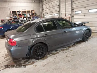 2006 BMW 3 Series 325i with VIN WBAVB13526KX36980, listed as a IAAI auction lot 42308455 with 147,512 mi miles and . Bid and sale history available at DreamBid. Image 4.