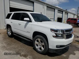 2015 Chevrolet Tahoe LT with VIN 1GNSCBKC8FR181394, listed as a Copart auction lot 53846435 with 191,875 mi miles and Salvage title. Bid and sale history available at DreamBid. Image 4.