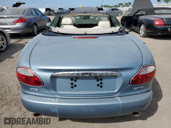 2006 Jaguar XK8 with VIN SAJDA42CX62A45610, listed as a Copart auction lot 75286034 with Not Provided miles and Salvage Title. Bid and sale history available at carsss.com. Image 6.