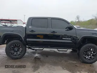 2017 Toyota Tacoma SR5 with VIN 5TFCZ5AN6HX076769, listed as a IAAI auction lot 41889869 with 208,894 mi miles. Bid and sale history available at carsss.com. Image 13.