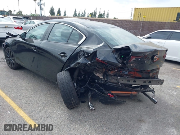 2024 Mazda 3 S Select Sport with VIN 3MZBPABM4RM406719, listed as a IAAI auction lot 42379863 with 3,396 mi miles and . Bid and sale history available at DreamBid. Image 3.
