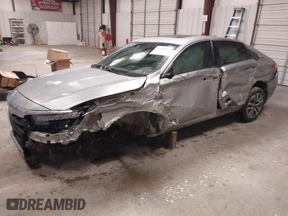 2018 Honda Accord Touring z VIN 1HGCV3F94JA001591, wystawiony jako IAAI lot #42161624 z przebiegiem 100 591 mil mil oraz . Historia ofert i sprzedaży dostępna na DreamBid. Obrazek 23.