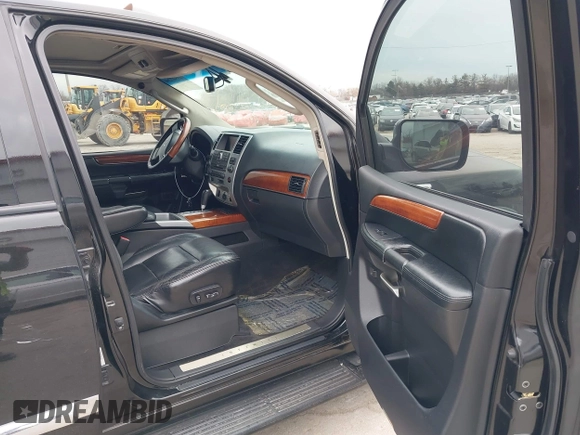 2009 Infiniti QX56 with VIN 5N3AA08C09N902599, listed as a IAAI auction lot 41502266 with 174,823 mi miles. Bid and sale history available at carsss.com. Image 5.