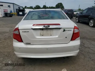 2012 Ford Fusion Hybrid с VIN 3FADP0L35CR184476, выставлен на аукционе Copart как лот 63907885 с пробегом 230 589 миль миль и Списание • Salvage title. История ставок и продаж доступна на DreamBid. Изображение 6.