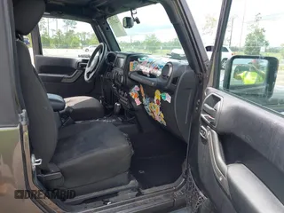 2016 Jeep Wrangler Black Bear with VIN 1C4AJWAGXGL258874, listed as a IAAI auction lot 42497153 with 93,294 mi miles and . Bid and sale history available at DreamBid. Image 5.