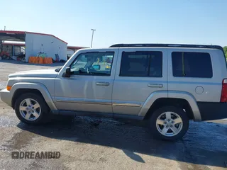 2007 Jeep Commander Sport z VIN 1J8HG48K07C559271, wystawiony jako IAAI lot #42032853 z przebiegiem 236 443 mil mil oraz . Historia ofert i sprzedaży dostępna na DreamBid. Obrazek 14.