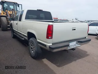 1995 GMC Sierra 1500 z VIN 2GTEK19K9S1591415, wystawiony jako IAAI lot #41793889 z przebiegiem 334 435 mil mil oraz . Historia ofert i sprzedaży dostępna na DreamBid. Obrazek 3.