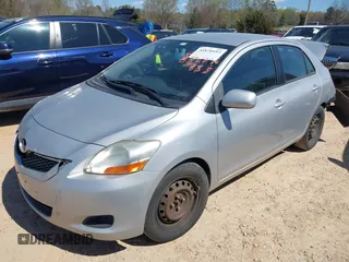2010 Toyota Yaris with VIN JTDBT4K35A1359371, listed as a IAAI auction lot 41870593 with 207,616 mi miles. Bid and sale history available at carsss.com. Image 2.