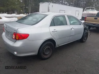 2010 Toyota Corolla with VIN 2T1BU4EE0AC243517, listed as a IAAI auction lot 41732116 with 195,855 mi miles. Bid and sale history available at carsss.com. Image 4.