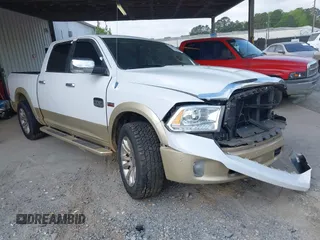 2014 Ram 1500 Longhorn z VIN 1C6RR6PT0ES129729, wystawiony jako IAAI lot #42018089 z przebiegiem 126 074 mil mil oraz . Historia ofert i sprzedaży dostępna na DreamBid. Obrazek 1.
