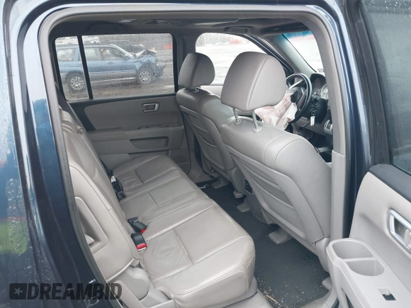 2009 Honda Pilot EX-L with VIN 5FNYF48699B055062, listed as a IAAI auction lot 41967409 with 300,781 mi miles and . Bid and sale history available at carsss.com. Image 8.