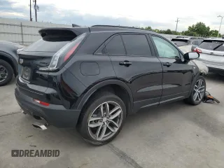 2023 Cadillac XT4 AWD Sport with VIN 1GYFZFR43PF105500, listed as a Copart auction lot 58658394 with 0 mi miles and Salvage Title. Bid and sale history available at carsss.com. Image 3.