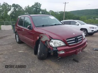 2002 Mercedes-Benz M 320/430/500 z VIN 4JGAB75E92A311981, wystawiony jako IAAI lot #42357172 z przebiegiem 171 737 mil mil oraz . Historia ofert i sprzedaży dostępna na DreamBid. Obrazek 6.