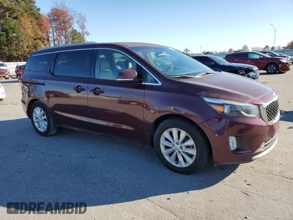 2015 Kia Sedona SX with VIN KNDMC5C12F6025689, listed as a Copart auction lot 83459954 with 124,716 mi miles and Clean Title. Bid and sale history available at carsss.com. Image 4.