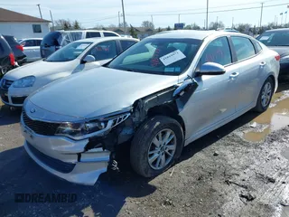 2016 Kia Optima LX with VIN 5XXGT4L34GG078857, listed as a IAAI auction lot 41819971 with 112,963 mi miles. Bid and sale history available at carsss.com. Image 2.