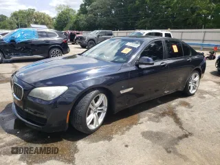 2014 BMW 7 Series 740i with VIN WBAYA6C50ED144168, listed as a Copart auction lot 57034655 with 118,806 mi miles and Salvage title. Bid and sale history available at DreamBid. Image 1.