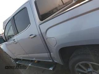 2018 GMC Canyon 2WD Denali z VIN 1GTG5EENXJ1256837, wystawiony jako IAAI lot #42139397 z przebiegiem 93 024 mil mil oraz . Historia ofert i sprzedaży dostępna na DreamBid. Obrazek 14.