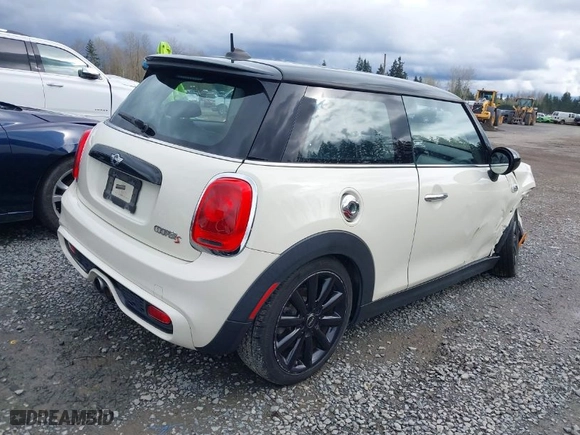 2016 MINI Cooper Hardtop S with VIN WMWXP7C59G2A42935, listed as a IAAI auction lot 41910245 with 106,154 mi miles. Bid and sale history available at carsss.com. Image 4.