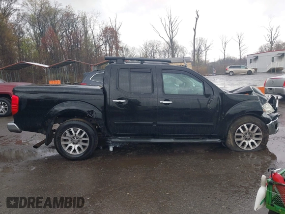 2011 Nissan Frontier Pro-4X with VIN 1N6AD0EV5BC440663, listed as a IAAI auction lot 41923918 with 168,331 mi miles and . Bid and sale history available at DreamBid. Image 13.
