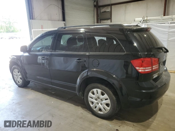 2017 Dodge Journey SE with VIN 3C4PDCABXHT506356, listed as a Copart auction lot 52409805 with 146,782 mi miles and Salvage Title. Bid and sale history available at DreamBid. Image 2.