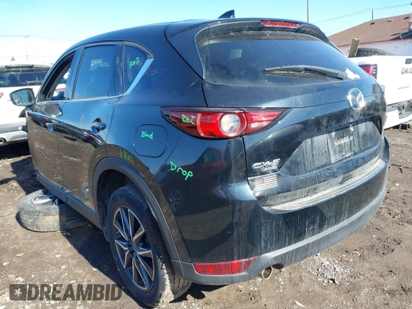 2018 Mazda CX-5 Grand Touring with VIN JM3KFBDM5J0441518, listed as a IAAI auction lot 41748941 with 64,639 mi miles. Bid and sale history available at carsss.com. Image 3.