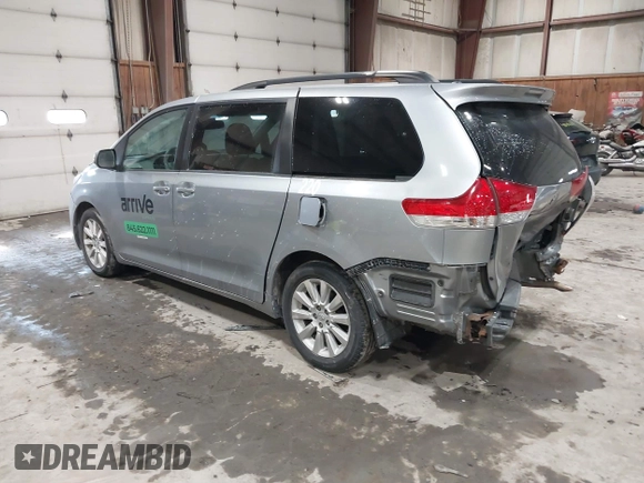 2013 Toyota Sienna LE with VIN 5TDJK3DC0DS056429, listed as a IAAI auction lot 41633193 with 167,321 mi miles and . Bid and sale history available at DreamBid. Image 3.