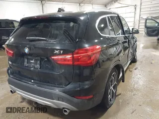 2018 BMW X1 xDrive28i with VIN WBXHT3C30J5K29383, listed as a IAAI auction lot 41503314 with 107,678 mi miles. Bid and sale history available at carsss.com. Image 4.
