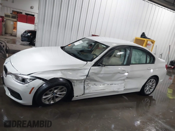 2018 BMW 3 Series 320i xDrive with VIN WBA8E5G56JNU47338, listed as a IAAI auction lot 41238204 with 54,596 mi miles. Bid and sale history available at carsss.com. Image 6.